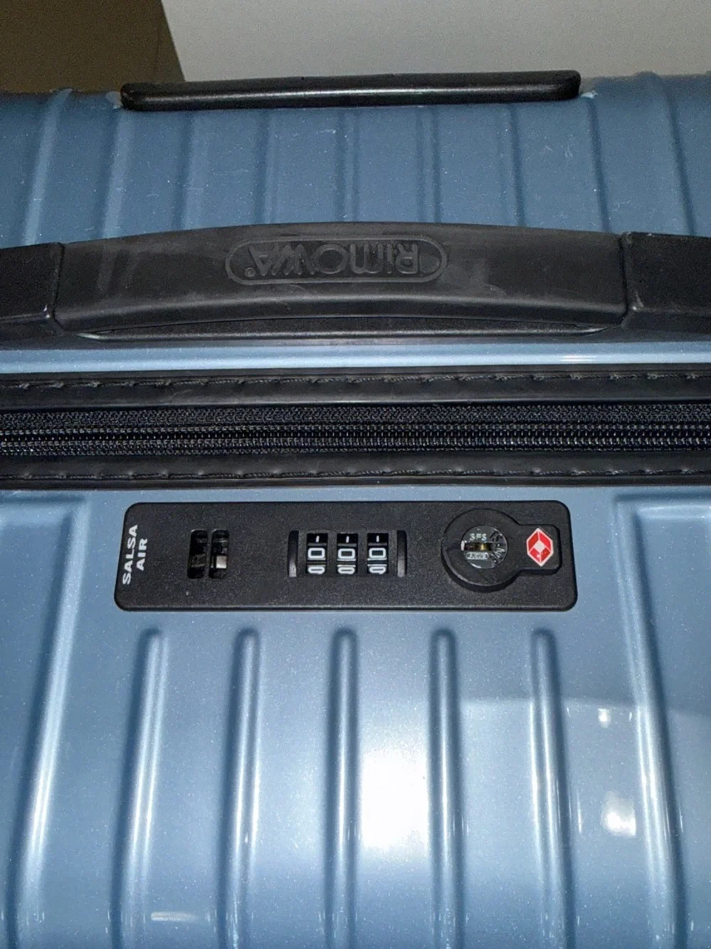 RIMOWA Salsa Air Multiwheel acrylic suitcase in Ice Blue.